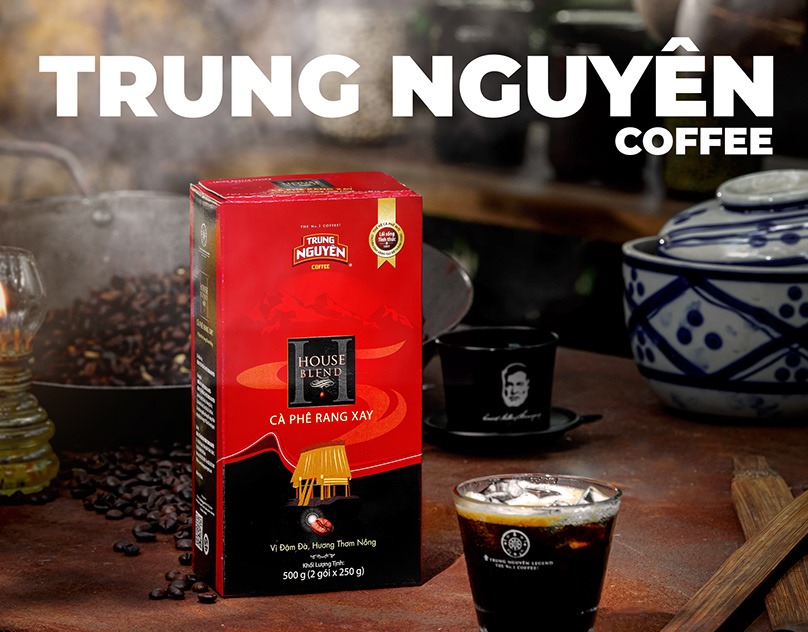 Trung Nguyen coffee packaging on a dark rustic set