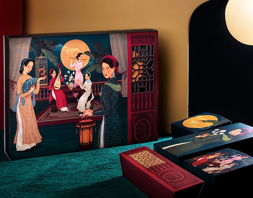 Illustrated mooncake gift boxes on teal velvet
