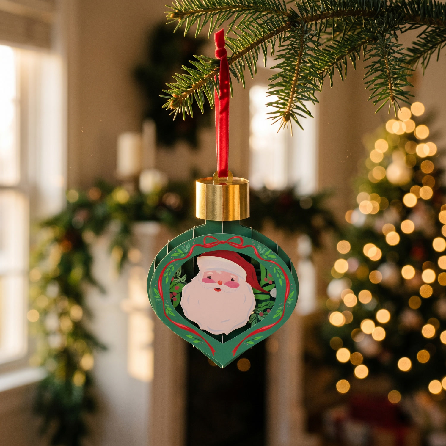 Paper ornament hanging from a fir branch with warm bokeh